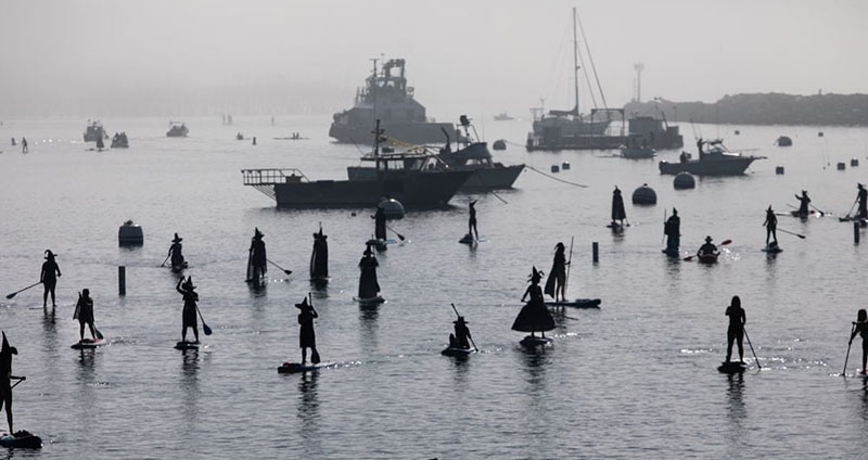 Why Are Witches and Warlocks Going Stand-Up Paddleboarding to Celebrate Halloween?